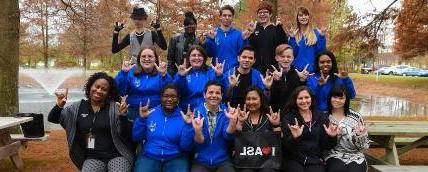 Delaware Tech's American Sign Language club signing 